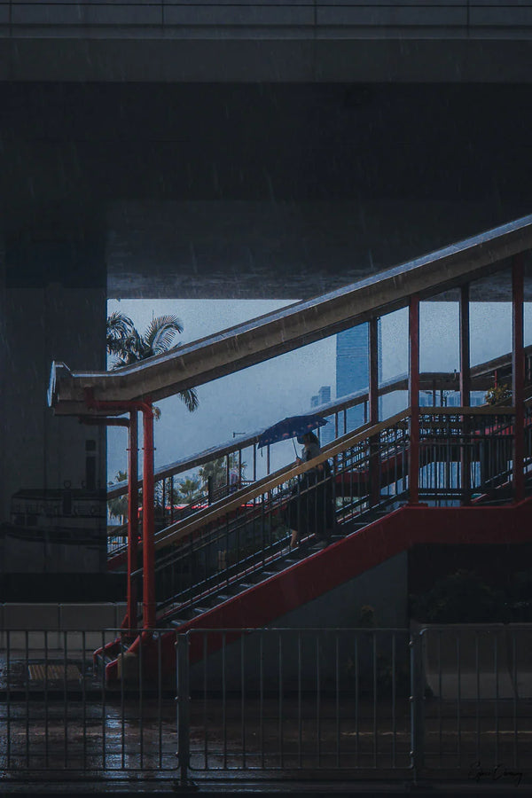 Woman braving the storm in Sheung Wan, Hong Kong, China.  Fine Art Limited Edition of 28. Photo © Copyright by Sylvère Clerempuy.
