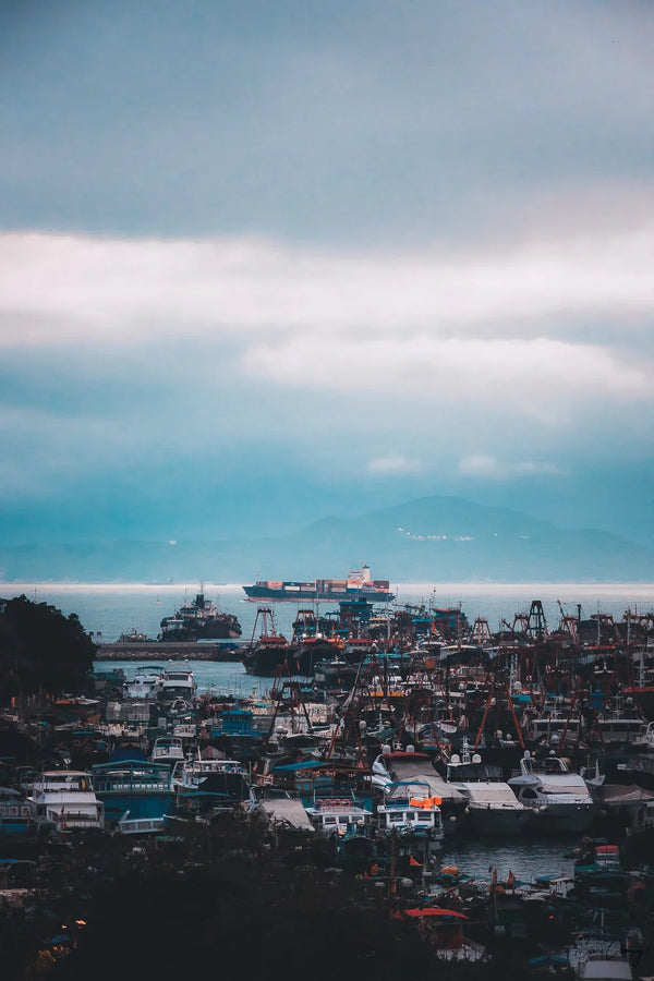 Cargo Boat passing by Abeerdeen Harbour in Hong Kong, China.  Fine Art Limited Edition of 28. Photo © Copyright by Sylvère Clerempuy.
