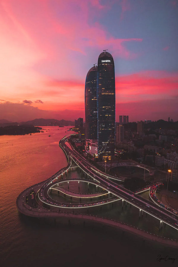 Burning Sunset shot of the Pullman Towers in Xiamen island, China.  Fine Art Limited Edition of 28. Photo © Copyright by Sylvère Clerempuy.