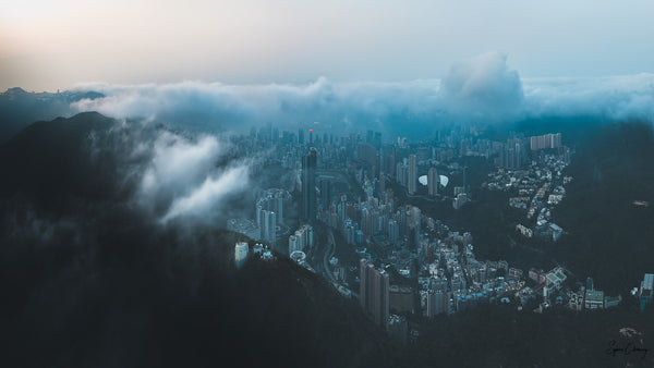 View of Hong Kong Island from Happy Valley to Central under the clouds  Fine Art Limited Edition of 28. Photo © Copyright by Sylvère Clerempuy.